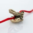 (image for) Alien with Tail Bead in Brass by Russki Designs