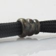 (image for) Cone Spacer Bead in Brass With Black Patina by Covenant Everyday Gear