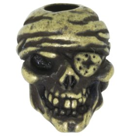 One-Eyed Jack Skull Bead in Roman Brass Oxide Finish by Schmuckatelli Co.