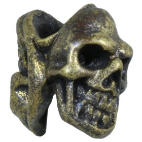 Two Face Skull in Brass With Black Patina by Covenant Everyday Gear